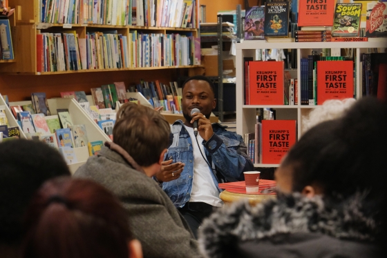 Michael speaking at a book event